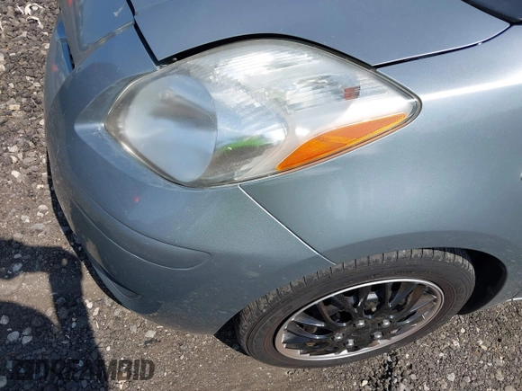 2011 Toyota Yaris with VIN JTDJT4K37B5336583, listed as a IAAI auction lot 39745031 with 229,326 mi miles. Bid and sale history available at carsss.com. Image 6.