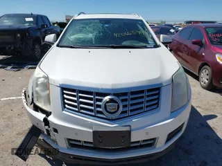2016 Cadillac SRX Luxury Collection z VIN 3GYFNBE3XGS505311, wystawiony jako IAAI lot #42066399 z przebiegiem 87 132 mil mil oraz . Historia ofert i sprzedaży dostępna na DreamBid. Obrazek 13.