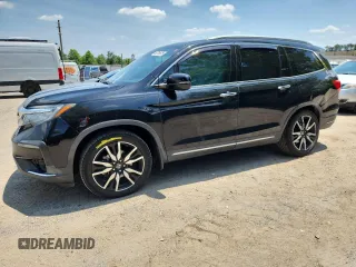 2019 Honda Pilot Elite with VIN 5FNYF6H04KB015842, listed as a Copart auction lot 62219615 with 152,405 mi miles and Salvage title. Bid and sale history available at DreamBid. Image 1.
