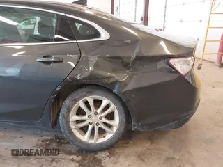 2018 Chevrolet Malibu LT z VIN 1G1ZD5ST5JF223948, wystawiony jako IAAI lot #42248560 z przebiegiem 75 643 mil mil oraz . Historia ofert i sprzedaży dostępna na DreamBid. Obrazek 6.