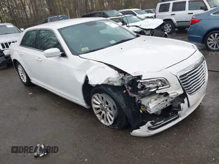 2014 Chrysler 300 with VIN 2C3CCAAG5EH128036, listed as a IAAI auction lot 41988327 with 153,809 mi miles. Bid and sale history available at carsss.com. Image 1.