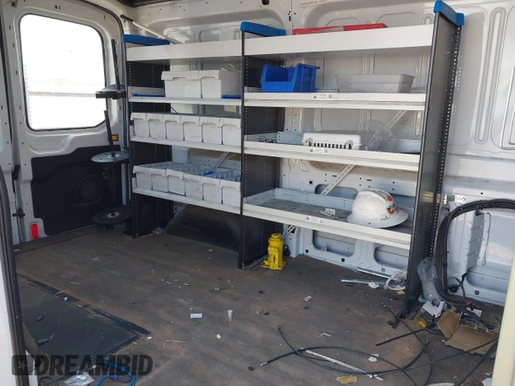 2016 Ford Transit Cargo with VIN 1FTYR1CMXGKA21918, listed as a IAAI auction lot 41528526 with 213,033 mi miles and . Bid and sale history available at DreamBid. Image 8.