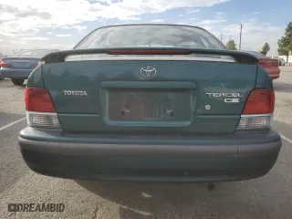 1998 Toyota Tercel DX with VIN JT2AC52L5W0338284, listed as a Copart auction lot 47397795 with 21,314 mi miles and Clean Title. Bid and sale history available at carsss.com. Image 6.