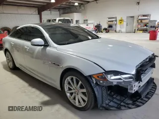 2016 Jaguar XJ R-Sport with VIN SAJWJ1CDXG8W00145, listed as a Copart auction lot 49901234 with 76,629 mi miles and . Bid and sale history available at DreamBid. Image 4.