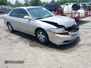 1998 Honda Accord EX with VIN 1HGCG6671WA055058, listed as a IAAI auction lot 42526616 with 274,878 mi miles and . Bid and sale history available at DreamBid. Image 1.