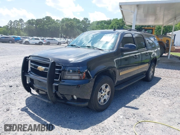 2007 Chevrolet Suburban LT z VIN 1GNFC160X7R218023, wystawiony jako IAAI lot #42305941 z przebiegiem 237 987 mil mil oraz . Historia ofert i sprzedaży dostępna na DreamBid. Obrazek 2.