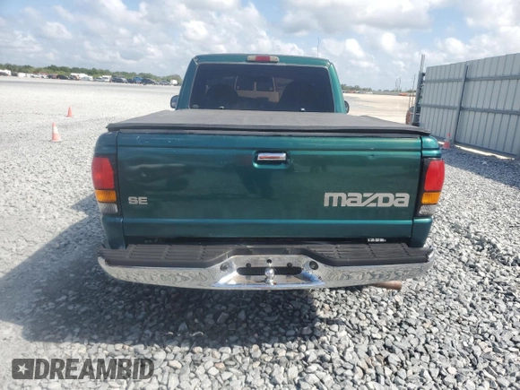 1999 Mazda B-Series Truck SX z VIN 4F4YR12CXXTM34917, wystawiony jako Copart lot #50821635 z przebiegiem 121 165 mil mil oraz Szkoda całkowita • Salvage title. Historia ofert i sprzedaży dostępna na DreamBid. Obrazek 6.