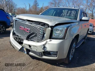 2016 GMC Yukon Denali with VIN 1GKS2CKJ5GR393269, listed as a IAAI auction lot 41963630 with 158,584 mi miles and . Bid and sale history available at DreamBid. Image 6.