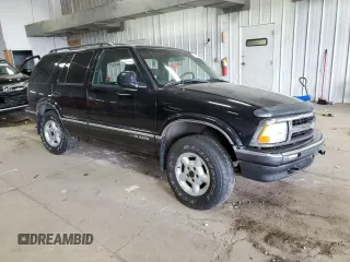 1997 Chevrolet Blazer LS z VIN 1GNDT13W7V2236355, wystawiony jako Copart lot #57983265 z przebiegiem Nie podano mil oraz Nie do naprawy • Non repairable. Historia ofert i sprzedaży dostępna na DreamBid. Obrazek 4.