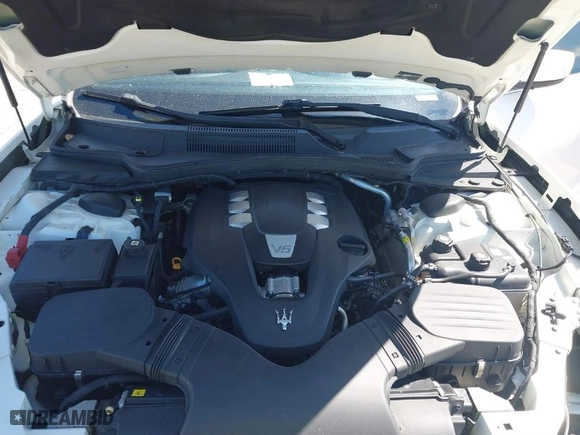 2015 Maserati Ghibli with VIN ZAM57XSA7F1155160, listed as a IAAI auction lot 41749868 with 107,304 mi miles. Bid and sale history available at carsss.com. Image 10.