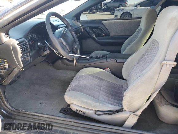 2002 Chevrolet Camaro Z28 z VIN 2G1FP22G922146192, wystawiony jako Copart lot #87924525 z przebiegiem 151 770 mil mil oraz Szkoda całkowita • Salvage title. Historia ofert i sprzedaży dostępna na DreamBid. Obrazek 7.