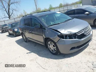 2012 Honda Odyssey EX-L with VIN 5FNRL5H69CB047425, listed as a IAAI auction lot 42064979 with 242,409 mi miles and . Bid and sale history available at carsss.com. Image 1.