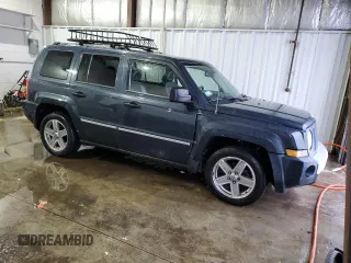 2008 Jeep Patriot Limited with VIN 1J8FT48W48D648696, listed as a Copart auction lot 45197545 with 210,250 mi miles and Salvage Title. Bid and sale history available at DreamBid. Image 4.