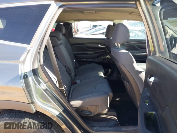 2019 Hyundai Santa Fe SE with VIN 5NMS23AD2KH134016, listed as a IAAI auction lot 41977240 with 61,448 mi miles and . Bid and sale history available at DreamBid. Image 8.