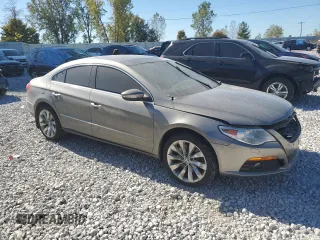 2011 Volkswagen CC Executive 4Motion with VIN WVWGU7AN4BE729002, listed as a Copart auction lot 74423234 with 180,640 mi miles and Clean Title. Bid and sale history available at carsss.com. Image 4.