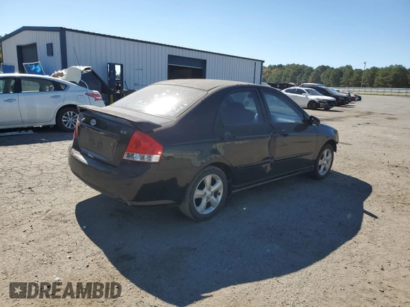 2009 Kia Spectra SX with VIN KNAFE221895022564, listed as a Copart auction lot 76997864 with 189,177 mi miles and Salvage Title. Bid and sale history available at carsss.com. Image 3.