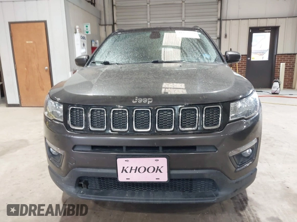 2018 Jeep Compass Latitude with VIN 3C4NJDBB9JT116391, listed as a IAAI auction lot 41953729 with 129,331 mi miles and . Bid and sale history available at DreamBid. Image 12.
