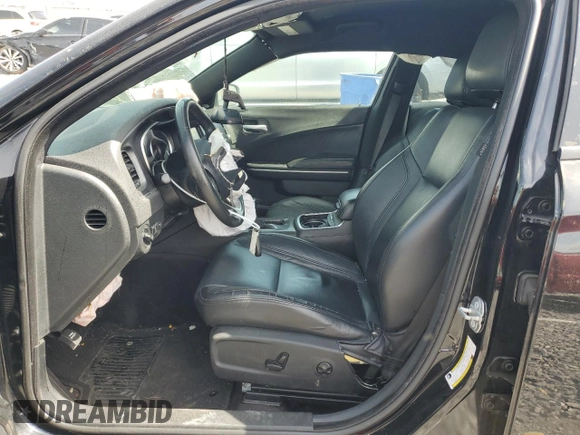 2018 Dodge Charger SXT Plus with VIN 2C3CDXHG2JH329120, listed as a Copart auction lot 49746455 with 106,182 mi miles and Salvage Title. Bid and sale history available at carsss.com. Image 7.
