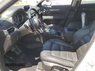 2018 Mazda CX-5 Grand Touring z VIN JM3KFBDM1J0473754, wystawiony jako Copart lot #60362245 z przebiegiem 72 792 mil mil oraz Szkoda całkowita • Salvage title. Historia ofert i sprzedaży dostępna na DreamBid. Obrazek 7.