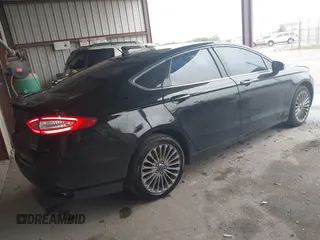 2014 Ford Fusion Titanium with VIN 3FA6P0K99ER235785, listed as a IAAI auction lot 41946638 with 212,939 mi miles and . Bid and sale history available at DreamBid. Image 4.