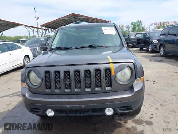 2014 Jeep Patriot Latitude with VIN 1C4NJRFB3ED847997, listed as a IAAI auction lot 42109140 with 121,299 mi miles and . Bid and sale history available at carsss.com. Image 6.