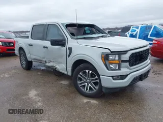 2023 Ford F-150 XL with VIN 1FTEW1C50PKF33143, listed as a IAAI auction lot 41549135 with 9,744 mi miles. Bid and sale history available at carsss.com. Image 1.