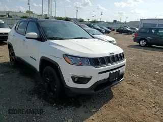 2019 Jeep Compass Latitude z VIN 3C4NJDBB2KT696732, wystawiony jako Copart lot #60519335 z przebiegiem 85 436 mil mil oraz Szkoda całkowita • Salvage title. Historia ofert i sprzedaży dostępna na DreamBid. Obrazek 14.