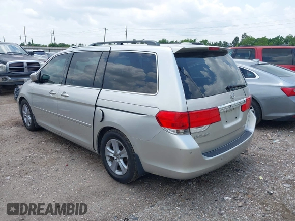 2009 Honda Odyssey Touring z VIN 5FNRL38949B002092, wystawiony jako IAAI lot #42072003 z przebiegiem Nie podano mil oraz . Historia ofert i sprzedaży dostępna na DreamBid. Obrazek 3.