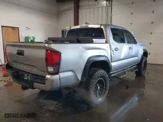 2018 Toyota Tacoma SR with VIN 5TFCZ5AN0JX132968, listed as a IAAI auction lot 41605762 with 106,233 mi miles. Bid and sale history available at carsss.com. Image 4.