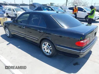 2002 Mercedes-Benz E-Class with VIN WDBJF65J62B404868, listed as a IAAI auction lot 42121837 with 107,415 mi miles. Bid and sale history available at carsss.com. Image 3.