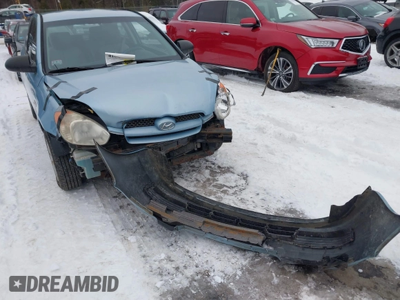 2008 Hyundai Accent GS with VIN KMHCM36C98U062601, listed as a IAAI auction lot 41565161 with 148,281 mi miles. Bid and sale history available at carsss.com. Image 12.