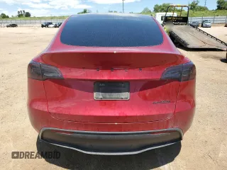 2024 Tesla Model Y Long Range z VIN 7SAYGDEE6RF156183, wystawiony jako Copart lot #61410155 z przebiegiem 27 112 mil mil oraz Szkoda całkowita • Salvage title. Historia ofert i sprzedaży dostępna na DreamBid. Obrazek 6.