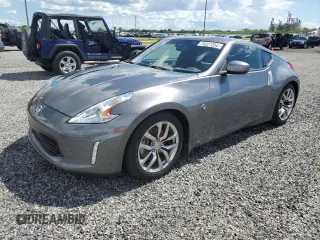 2014 Nissan 370Z with VIN JN1AZ4EH6EM633797, listed as a Copart auction lot 74027354 with Not Provided miles and Salvage Title. Bid and sale history available at DreamBid. Image 1.