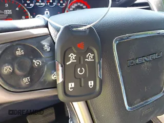 2015 GMC Yukon Denali with VIN 1GKS1CKJ8FR575730, listed as a IAAI auction lot 42048050 with 113,077 mi miles. Bid and sale history available at carsss.com. Image 11.