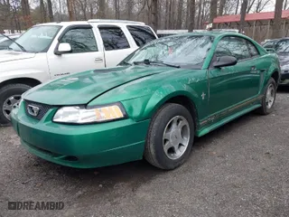 2001 Ford Mustang Standard with VIN 1FAFP40451F186932, listed as a IAAI auction lot 41519231 with 170,621 mi miles. Bid and sale history available at carsss.com. Image 2.