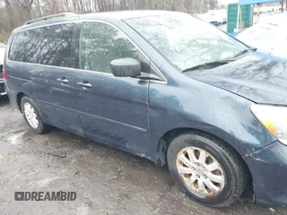 2010 Honda Odyssey EX with VIN 5FNRL3H41AB061674, listed as a IAAI auction lot 41954700 with 115,722 mi miles. Bid and sale history available at carsss.com. Image 6.