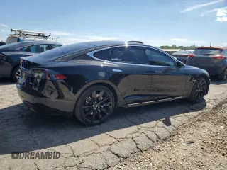 2017 Tesla Model S 100D with VIN 5YJSA1E28HF192397, listed as a Copart auction lot 55455995 with 90,534 mi miles and Salvage title. Bid and sale history available at DreamBid. Image 3.