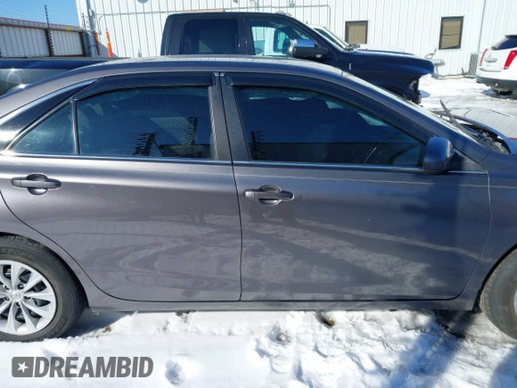 2015 Toyota Camry XLE with VIN 4T4BF1FK6FR465360, listed as a IAAI auction lot 41615471 with 166,584 mi miles. Bid and sale history available at carsss.com. Image 13.