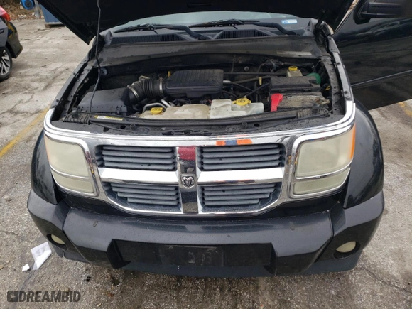 2007 Dodge Nitro SLT with VIN 1D8GU58K37W619822, listed as a Copart auction lot 43027905 with 105,719 mi miles and Salvage Title. Bid and sale history available at carsss.com. Image 11.