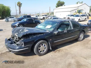 1997 Ford Thunderbird LX with VIN 1FALP62W8VH148943, listed as a IAAI auction lot 39864407 with 191,279 mi miles and . Bid and sale history available at DreamBid. Image 2.