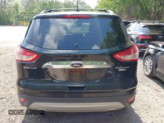 2016 Ford Escape Titanium with VIN 1FMCU9JX1GUC18335, listed as a IAAI auction lot 42396492 with 147,522 mi miles and . Bid and sale history available at DreamBid. Image 16.