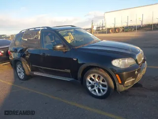 2011 BMW X5 35i with VIN 5UXZV4C54BL402935, listed as a IAAI auction lot 41198827 with 120,157 mi miles. Bid and sale history available at carsss.com. Image 1.