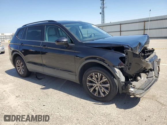 2018 Volkswagen Tiguan S with VIN 3VV1B7AXXJM069099, listed as a Copart auction lot 52345235 with 79,359 mi miles and Salvage title. Bid and sale history available at DreamBid. Image 4.
