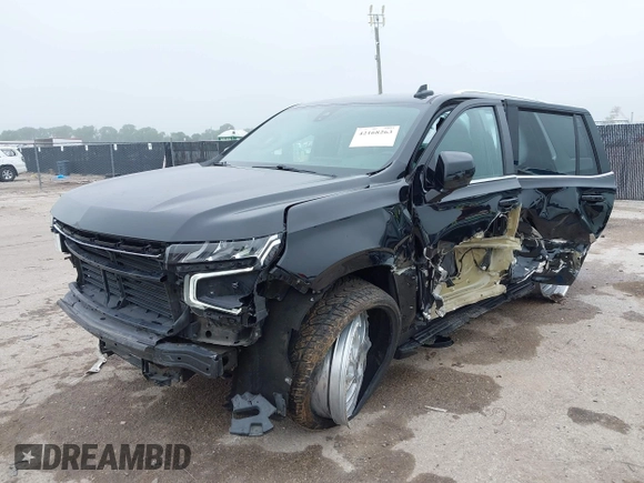 2021 Chevrolet Tahoe LT with VIN 1GNSCNKDXMR172381, listed as a IAAI auction lot 42168263 with 89,112 mi miles and . Bid and sale history available at DreamBid. Image 2.