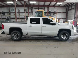 2017 GMC Sierra 1500 SLE z VIN 3GTU2MEC4HG374723, wystawiony jako IAAI lot #41400381 z przebiegiem 141 896 mil mil oraz . Historia ofert i sprzedaży dostępna na DreamBid. Obrazek 13.
