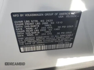 2024 Volkswagen Atlas SE with VIN 1V2LE2CA0RC236608, listed as a Copart auction lot 79430654 with 9,705 mi miles and Salvage title. Bid and sale history available at DreamBid. Image 13.