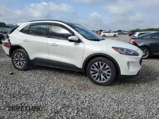 2020 Ford Escape Titanium with VIN 1FMCU9J91LUC38161, listed as a Copart auction lot 64293535 with 48,682 mi miles and Salvage title. Bid and sale history available at DreamBid. Image 4.