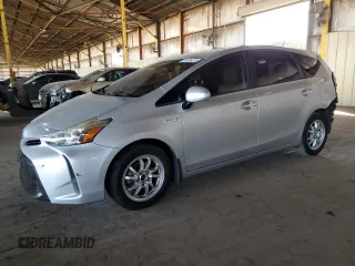 2015 Toyota Prius Two z VIN JTDZN3EU9FJ018912, wystawiony jako Copart lot #76106474 z przebiegiem 120 859 mil mil oraz Szkoda całkowita • Salvage title. Historia ofert i sprzedaży dostępna na DreamBid. Obrazek 1.