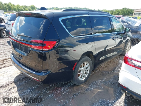 2022 Chrysler Pacifica Touring L with VIN 2C4RC1BG3NR106311, listed as a IAAI auction lot 42158651 with 68,473 mi miles and . Bid and sale history available at DreamBid. Image 4.