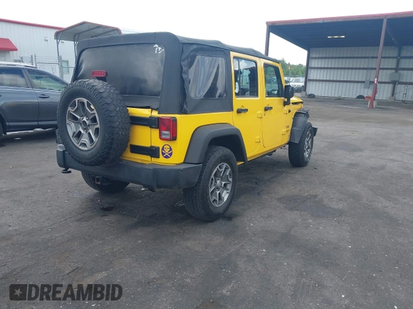 2015 Jeep Wrangler Unlimited Willys Wheeler with VIN 1C4BJWDG2FL643375, listed as a IAAI auction lot 42109724 with 112,357 mi miles and . Bid and sale history available at DreamBid. Image 4.